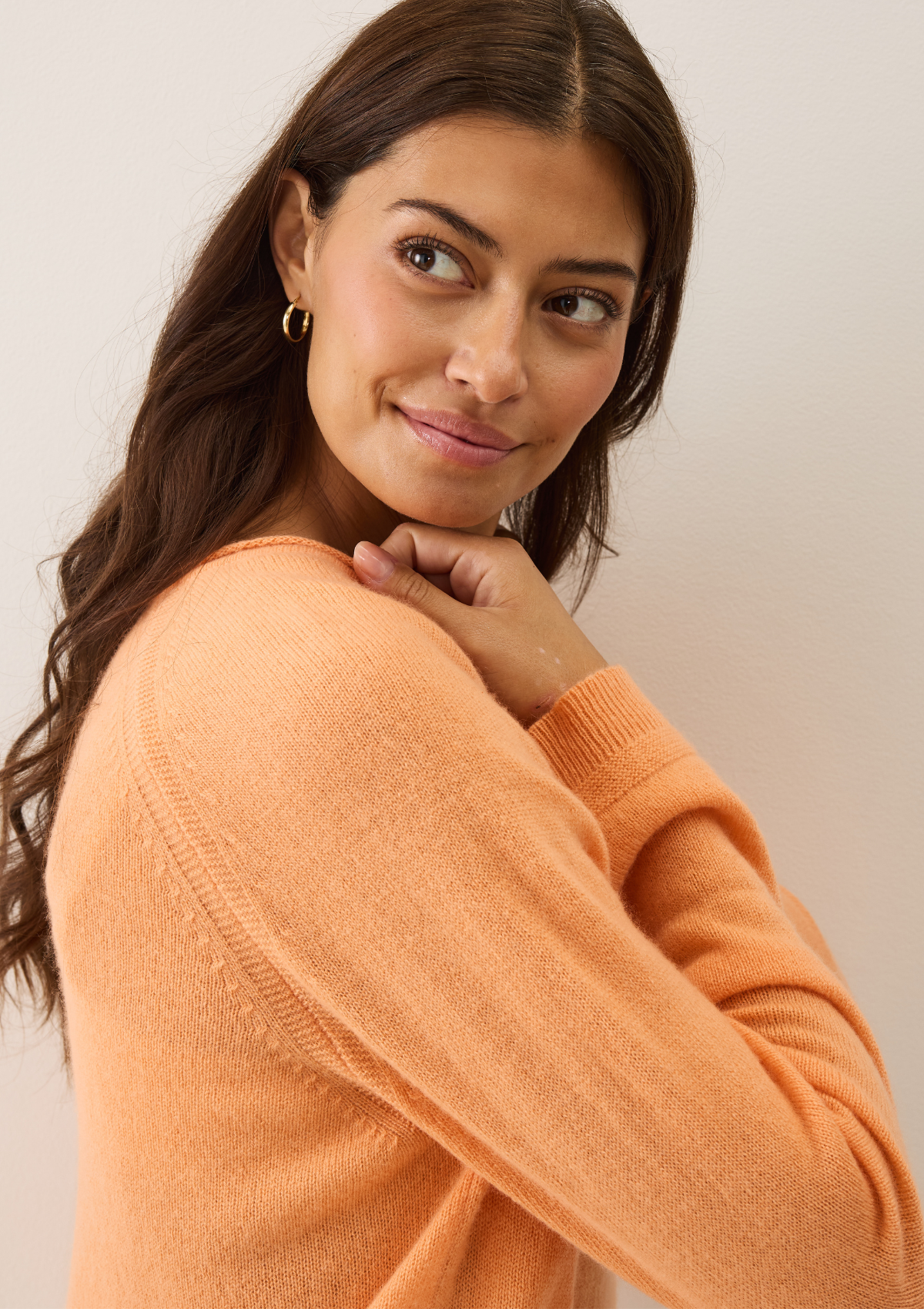 Featherweight sweater in Sunset Orange
