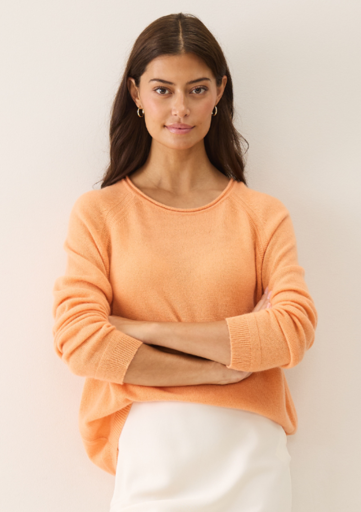 Featherweight sweater in Sunset Orange