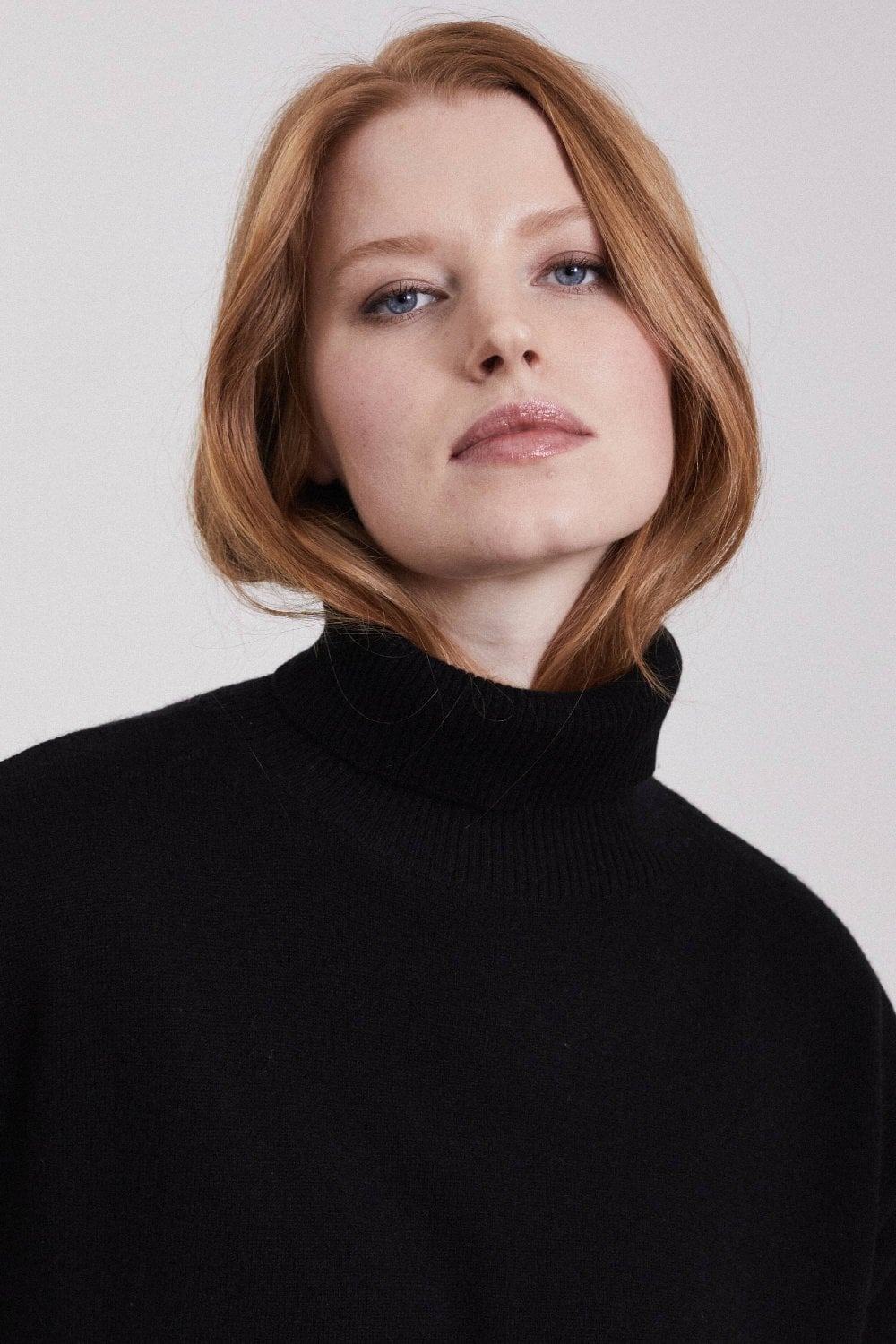 Polo Neck Cashmere Sweater in Black